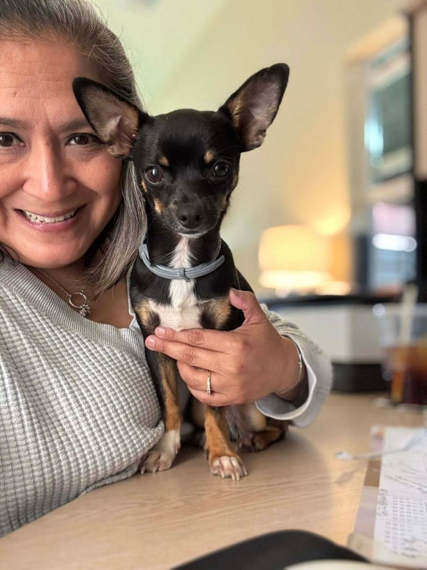 Elizabeth with dog from What's Up Dawg! pet-care facility