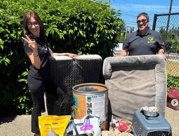 Barklandia Owner Rafael with pet supplies