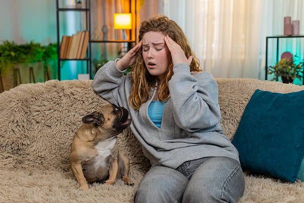 stressed woman with dog