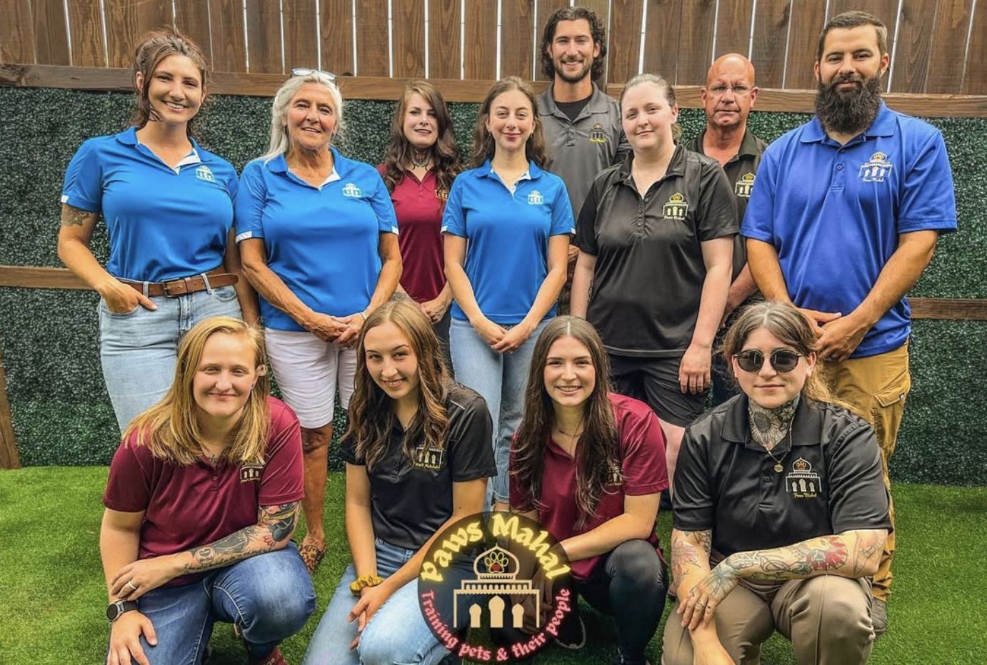 The Paws Mahal team outside their daycare and training facility in Central Arkansas